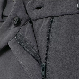 Deep grey wide-leg trousers with high-quality woven fabric and polished waist button detail