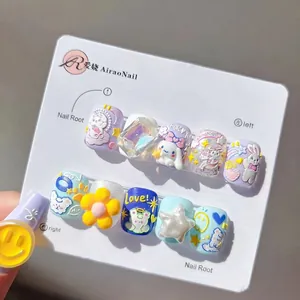 5D embossed press-on nails with 3D cartoon bunny and floral art in lilac and blue