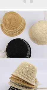 Detail of breathable hollow knit sun hats with elegant lace ribbons in various colors