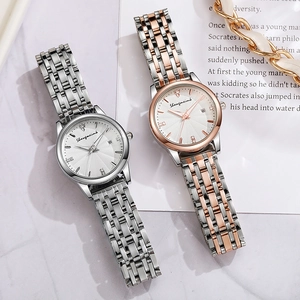 Montre à quartz étanche pour femme avec marqueurs diamant et bracelet en acier avec date