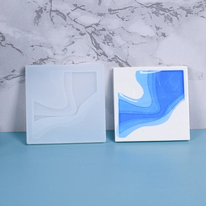 Macro view of square wave pattern resin mold with blue layered ocean effect sample
