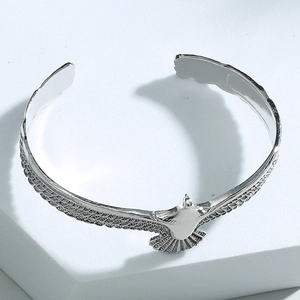 Vintage silver eagle feather open bangle with detailed embossed eagle wing patterns