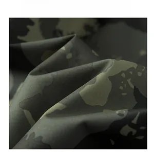 Close-up of durable ripstop camouflage fabric for men's windproof tactical jacket
