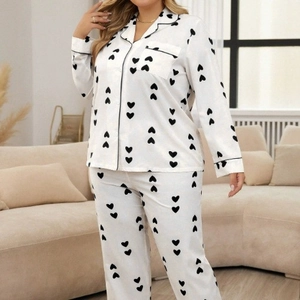 Women's plus size waffle pajamas set with long sleeves and black heart print pattern
