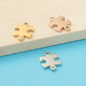 Three-piece puzzle pendants in gold rose gold and silver stainless steel with diamonds