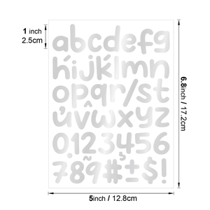 Macro shot of 1-inch silver metallic alphabet stickers and numbers on white background