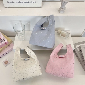 Drie canvas draagtassen met paillettensterren in blauw, wit en roze met gestreepte voering