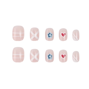 Short ballet press-on nails with light pink heart, blue floral, and striped patterns