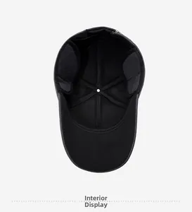 Interior view of warm baseball cap showing foldable earflaps and soft lining detail