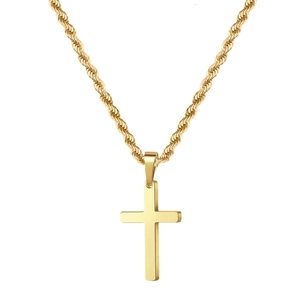 Close-up of golden cross pendant on a twist rope chain for men with polished finish