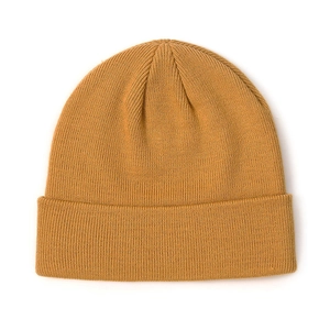 Detail of the ginger yellow rib-knitted beanie showing the fine texture and wide fold cuff