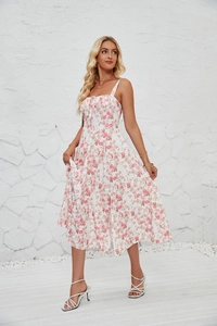 Detail of floral print sun dress showing the gathered chest tie and delicate spaghetti straps