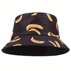 Close-up of black sun hat featuring vibrant yellow banana patterns and durable fabric