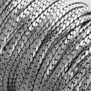 Polished 4mm stainless steel Cuban link chain with detailed silver finish texture