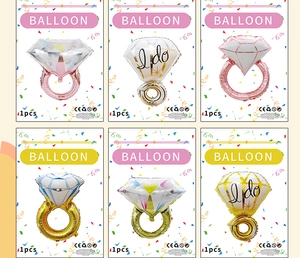 Detail of diamond ring foil balloons in retail packaging for wedding party decoration