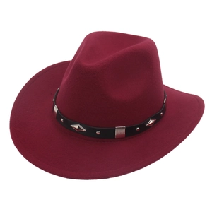 Detail of burgundy felt cowboy hat featuring black leather band with silver metal studs