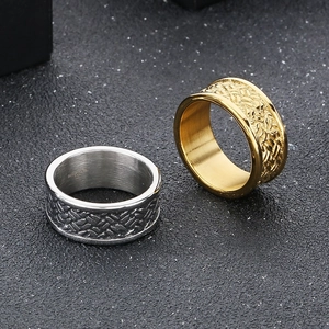 Macro detail of gold and silver braided texture rings with S925 engraving on inner band