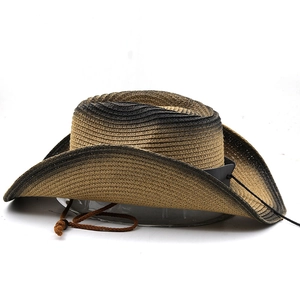 Close-up of Western straw cowboy hat showing woven texture and black gradient brim