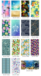 Macro view of various vibrant beach towel print patterns with unique style codes