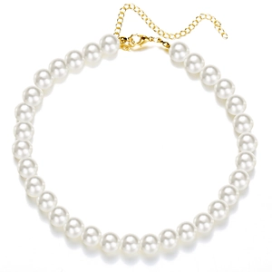 Detailed view of round white pearls necklace with adjustable golden lobster clasp and chain