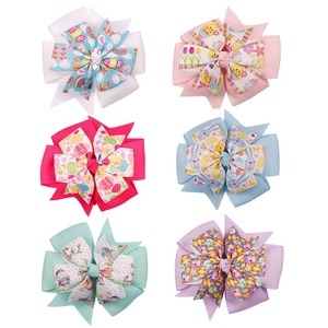 Detailed set of 6 Easter themed ribbon bows with bunny and egg patterns on white background