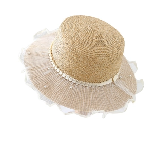 Beige flat top woven straw sun hat with white lace trim and pearls for summer