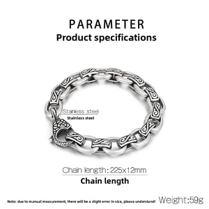 Detailed view of vintage stainless steel chain bracelet with intricate floral engravings