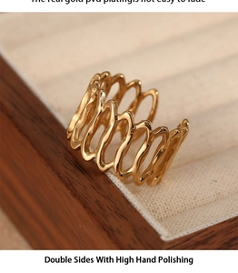 Macro shot of 316L stainless steel gold wave ring with high-polished PVD plating