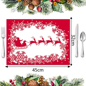 Detalle del mantel individual navideño de 45x32cm con diseño de Papá Noel y renos