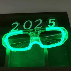 Detail shot of 2025 LED shutter glasses featuring bright green light-up number design