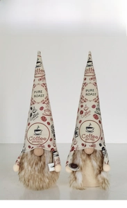 Detail of coffee gnomes with printed pure roast hats holding miniature cups and saucers