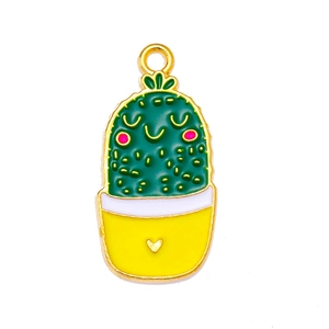 Macro shot of cartoon cactus charm with green enamel and yellow pot for DIY jewelry