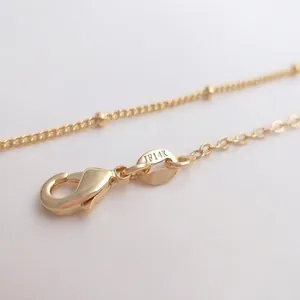 14K gold plated necklace chain with beaded flat O-link and lobster clasp design
