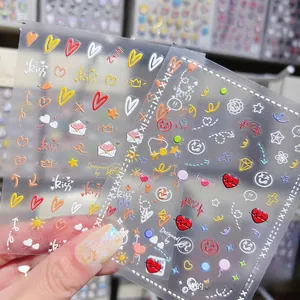 Detail of 5D embossed nail stickers with colorful hand-drawn hearts, stars and neon smileys