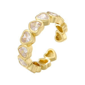 Adjustable gold open ring with seven heart-shaped cubic zirconia stones on white background