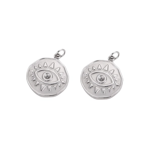 Silver evil eye evil stainless steel pendant with radiant embossed details on white base