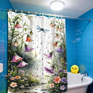 Detail of floral shower curtain with blue dragonfly and watercolor flowers in bathroom