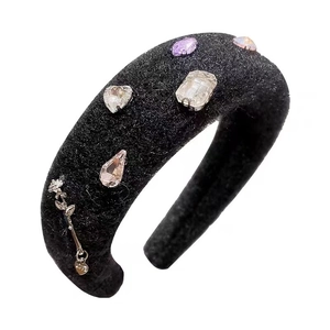 Elegant black plush headband with colorful rhinestone crystals and floral metal charms