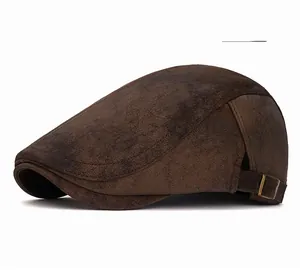 Close-up of the vintage brown newsboy cap with adjustable metal buckle and leather texture