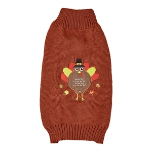 Close-up of a brown knit pet sweater featuring a detailed Thanksgiving turkey embroidery