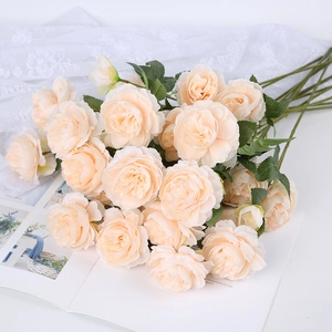 Artificial champagne peony bouquet with silk petals for wedding home decor on white background