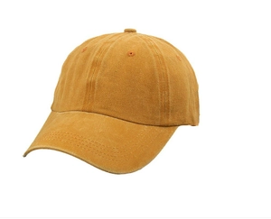 Detail view of the mustard yellow washed cotton baseball cap with reinforced stitched brim