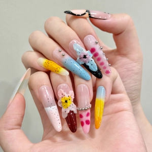 Handmade stiletto press-on nails with 3D embossed lilies and artistic gradient design