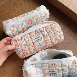 Quilted cotton floral cosmetic bag set of three in pink, yellow and blue floral patterns