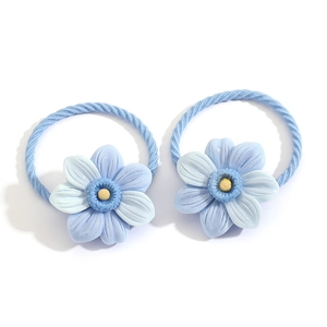 Set of two elastic blue plumeria flower hair ties for girls with yellow center detail