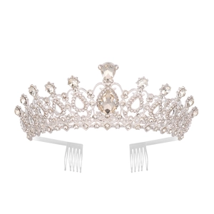Detail of silver bridal tiara featuring large pear-cut crystal and intricate alloy setting