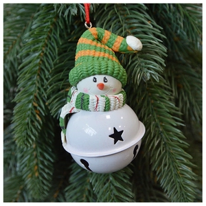 Detail of a snowman Christmas bell ornament with striped scarf and star cutouts on tree