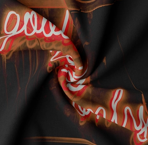Macro shot of Good Vibes Only print on high-quality black textile tapestry fabric