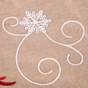 Linen Christmas table runner with white snowflake embroidery and pearl accent in beige