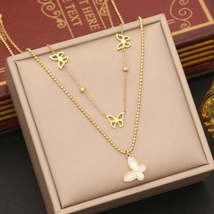 Elegant gold double layer butterfly necklace with shell pendant displayed in a gift box